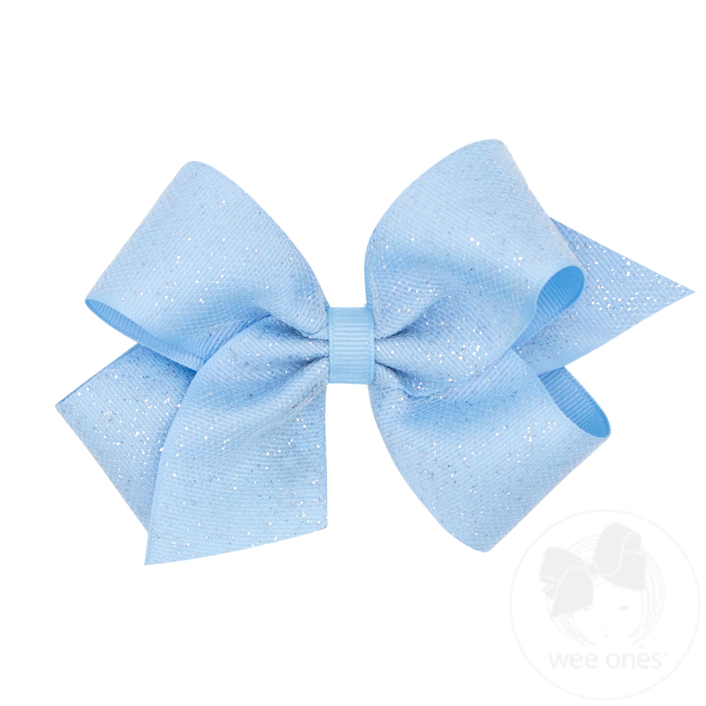 Baby blue glitter bow cut out, isolated on white background Stock