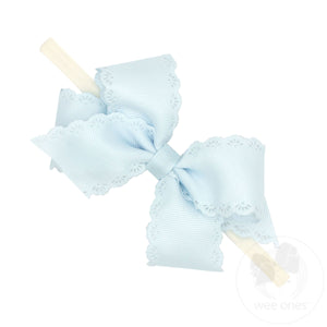 Small Grosgrain Hair Bow with Embossed Eyelet Edge on White Nylon Band