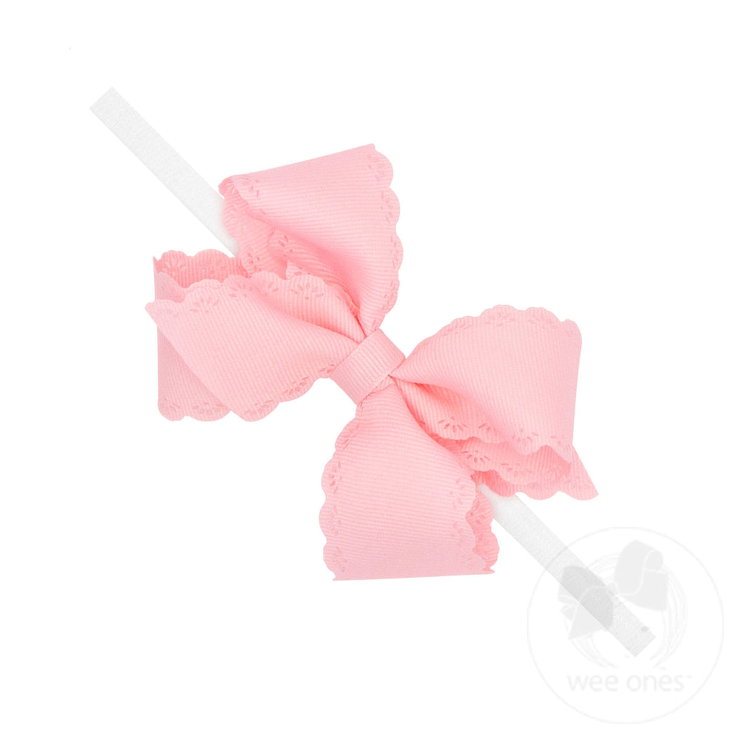 Small Grosgrain Hair Bow with Embossed Eyelet Edge on White Nylon Band