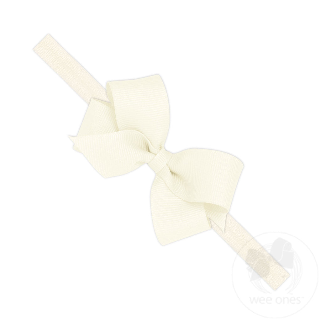 Mini Grosgrain Girls Hair Bow on a Soft Elastic Baby Band